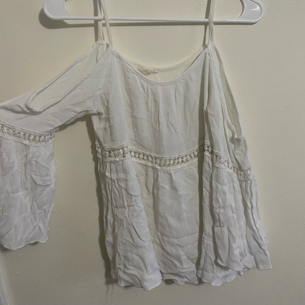 Flowy, shoulder-cutout top